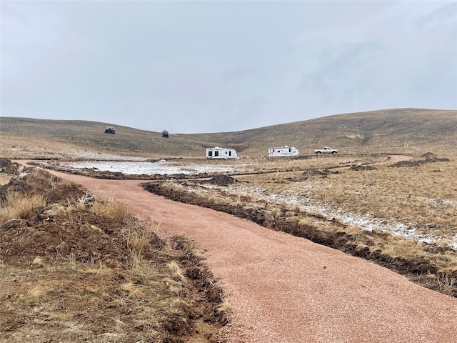 exterior space with a rural view