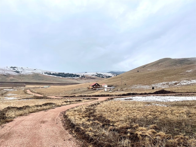 mountain view featuring a rural view