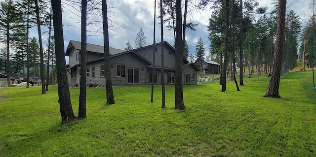 view of home's exterior featuring a yard