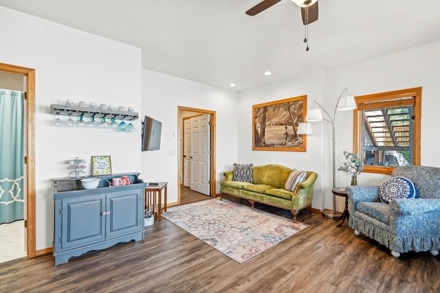 sitting room with baseboards, dark wood-type flooring, a ceiling fan, and recessed lighting