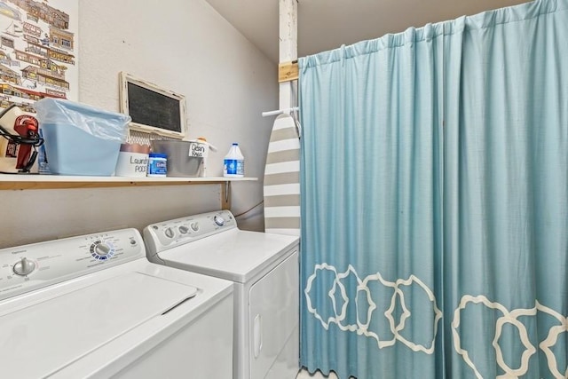 laundry area featuring laundry area and washing machine and clothes dryer