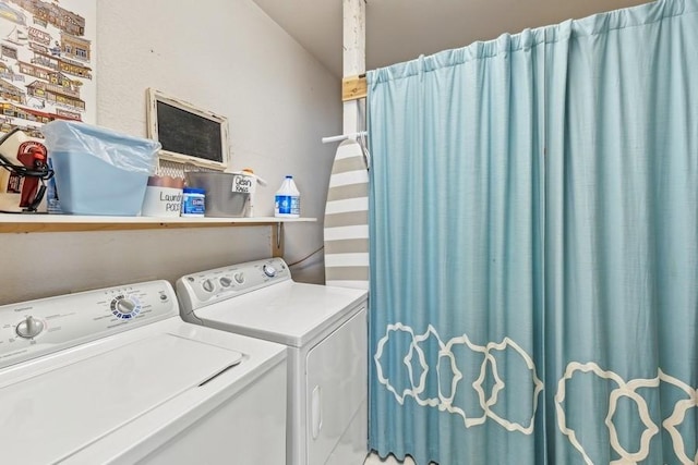 17431 Fishing Rock Ln, Bigfork, MT 59911 - laundry room featuring separate washer and dryer