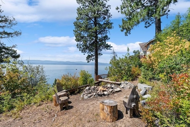 17431 Fishing Rock Ln, Bigfork, MT 59911 - water view with an outdoor fire pit
