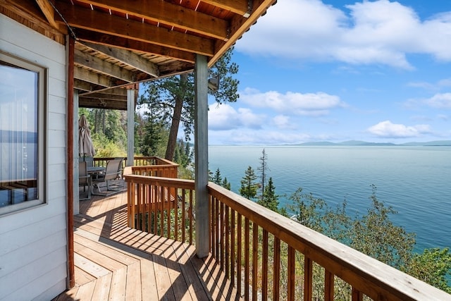 deck featuring a water view