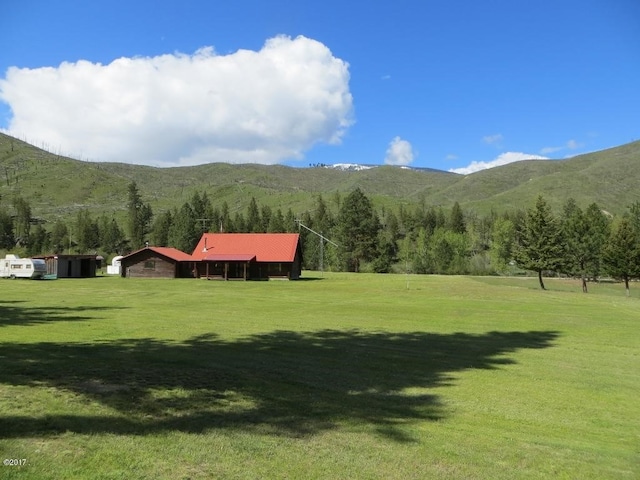 view of mountain feature with a rural view