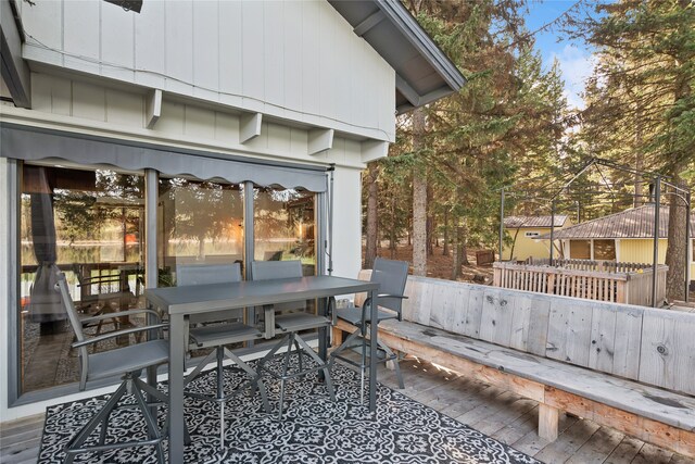 wooden deck featuring outdoor lounge area