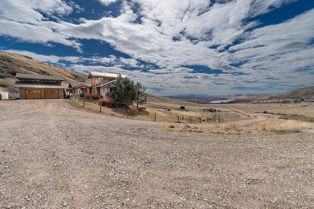 exterior space featuring a mountain view and a rural view