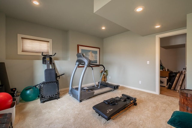 workout area featuring carpet flooring