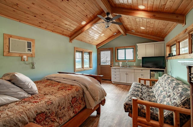 bedroom featuring lofted ceiling with beams, light hardwood / wood-style floors, wood ceiling, and sink