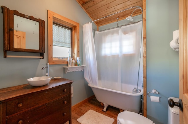 bathroom featuring vanity, vaulted ceiling, toilet, wood-type flooring, and wood ceiling