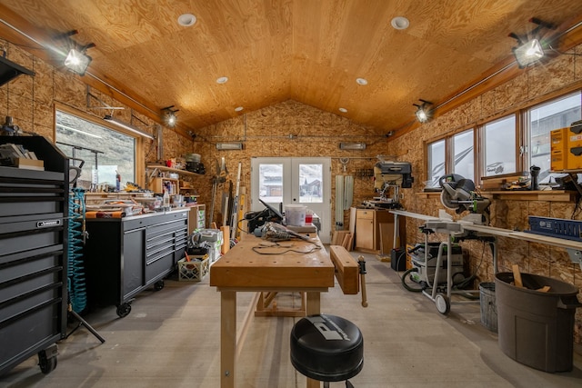 miscellaneous room with a workshop area, wooden ceiling, and lofted ceiling