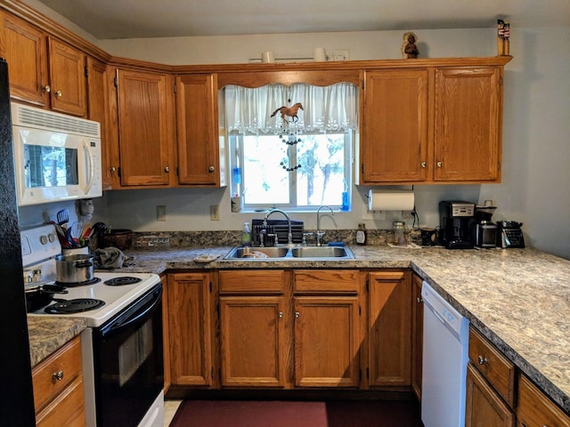 kitchen with white appliances and sink