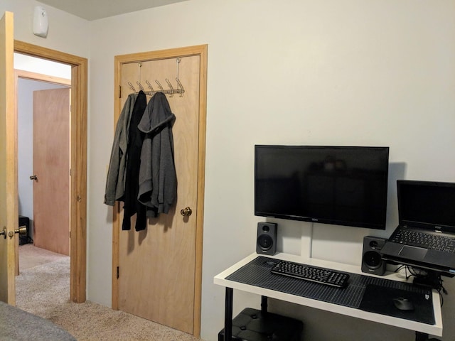 home office with light colored carpet