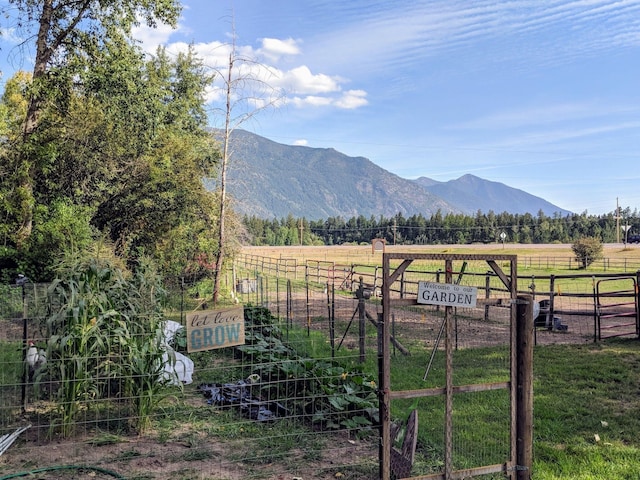 view of mountain feature with a rural view