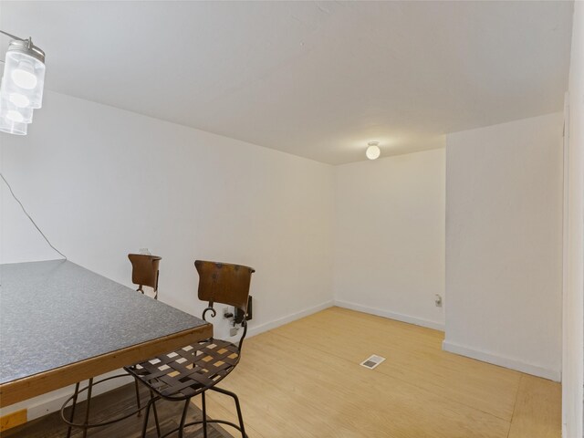 dining space featuring light hardwood / wood-style floors