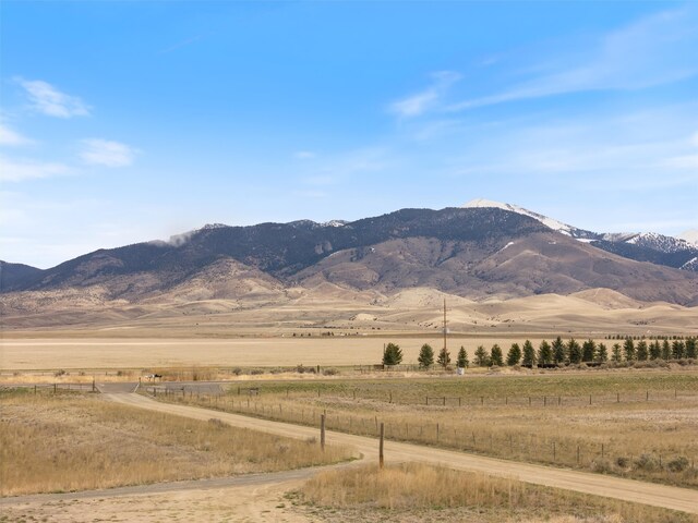 property view of mountains featuring a rural view