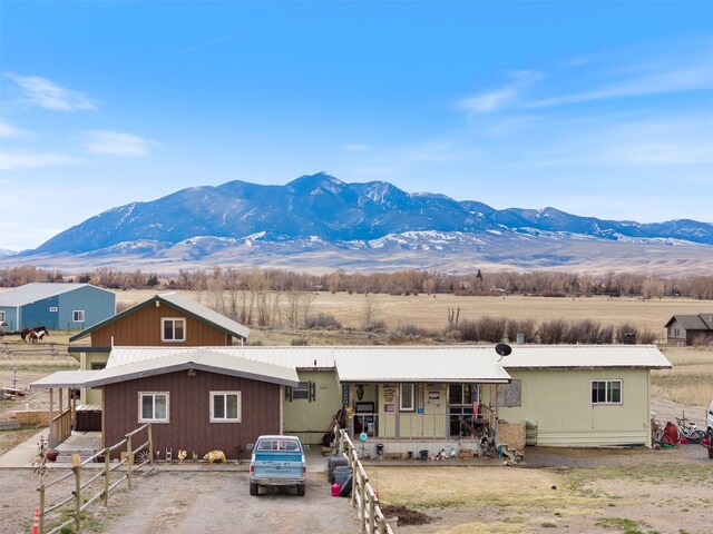 view of front facade featuring a mountain view