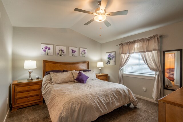 carpeted bedroom featuring ceiling fan and vaulted ceiling