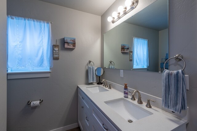 bathroom featuring double sink vanity