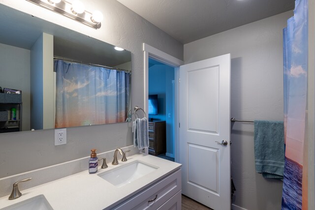 bathroom featuring large vanity