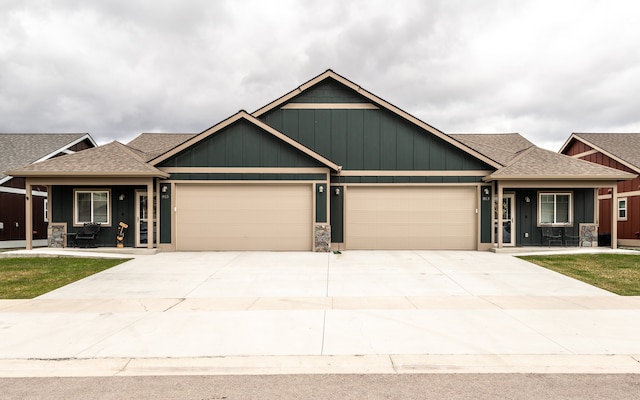 craftsman-style home with a garage