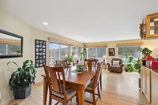 dining area with light wood-type flooring