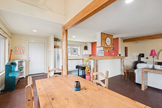 dining room with beamed ceiling