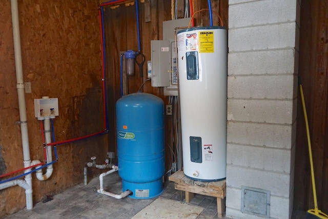 utility room with electric water heater