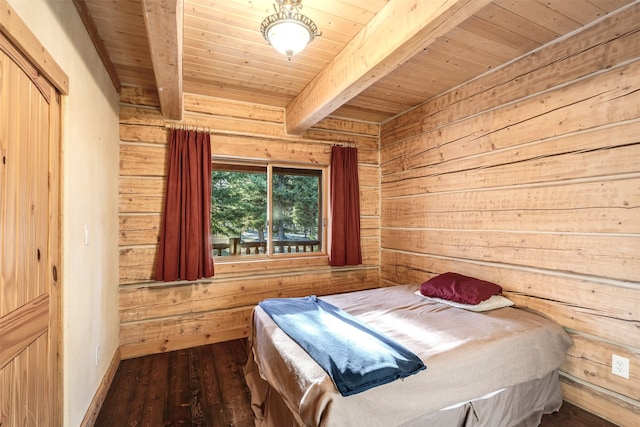 unfurnished bedroom with beamed ceiling, dark wood-type flooring, wooden ceiling, and wooden walls