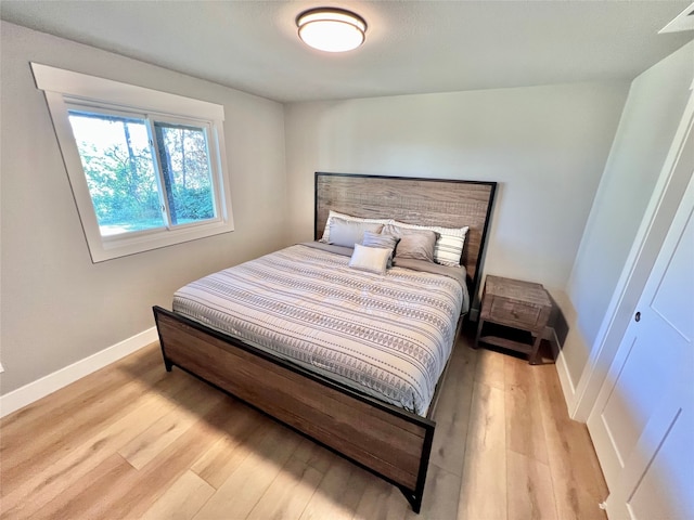 bedroom featuring light hardwood / wood-style floors