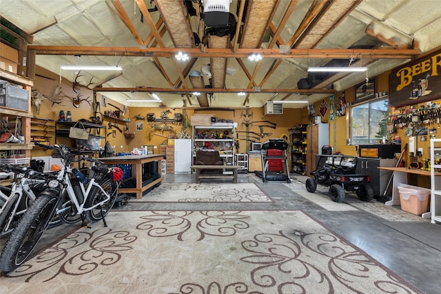 garage featuring a workshop area