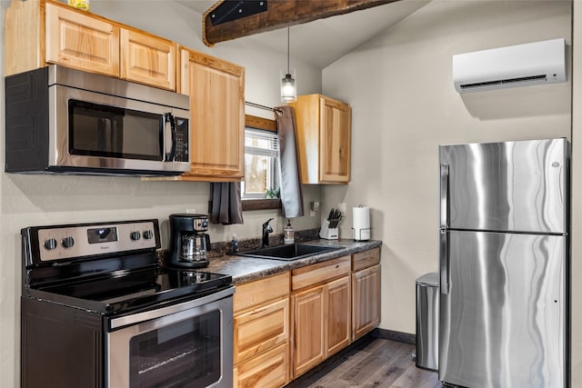 kitchen with dark hardwood / wood-style floors, stainless steel appliances, beam ceiling, sink, and a wall unit AC