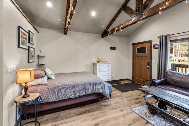 bedroom with high vaulted ceiling, beam ceiling, and wood-type flooring