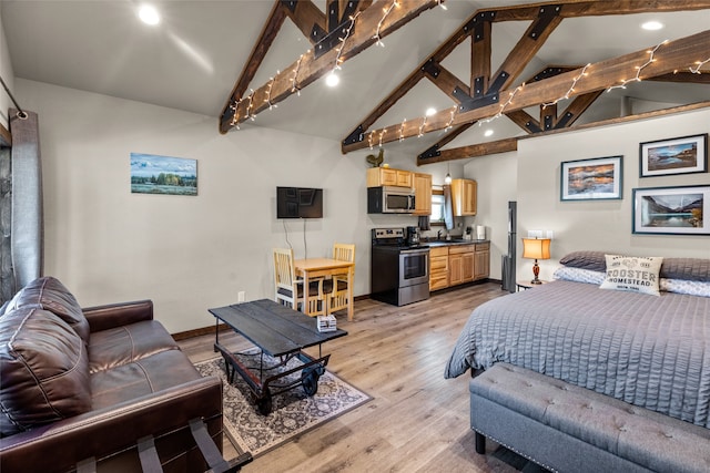 bedroom featuring light hardwood / wood-style flooring, beam ceiling, and high vaulted ceiling