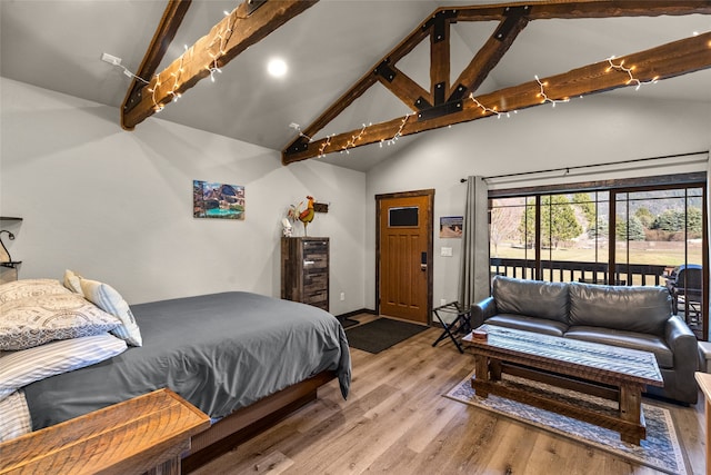 bedroom with high vaulted ceiling, light hardwood / wood-style flooring, and beam ceiling