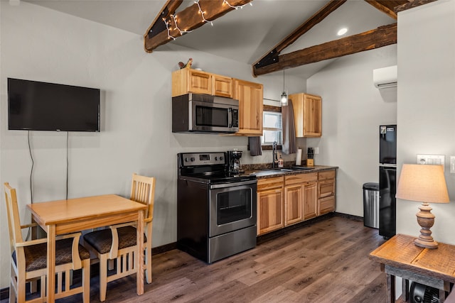 kitchen featuring dark wood-type flooring, stainless steel appliances, a wall mounted air conditioner, sink, and lofted ceiling with beams