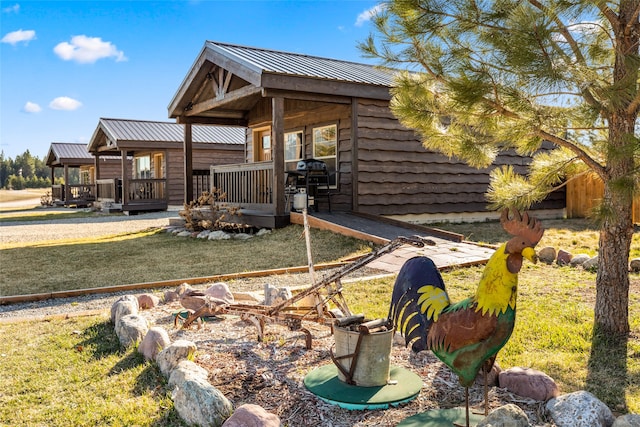 exterior space featuring covered porch