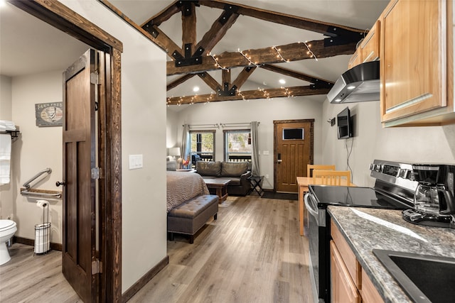 kitchen featuring light brown cabinets, lofted ceiling with beams, light hardwood / wood-style floors, and electric range