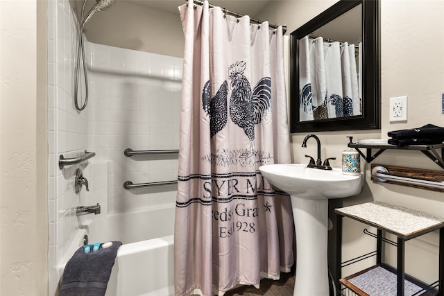 bathroom with shower / bath combo with shower curtain