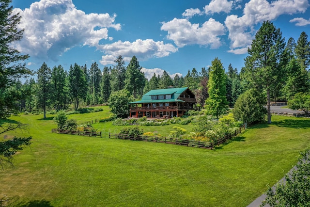 view of yard with a rural view