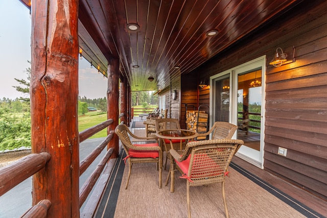 sunroom / solarium with wooden ceiling