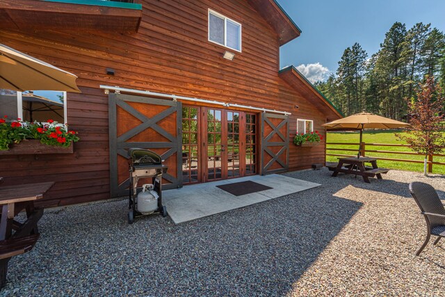 view of patio with a grill