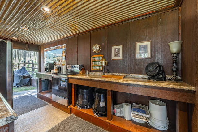 miscellaneous room with wooden walls and wooden ceiling