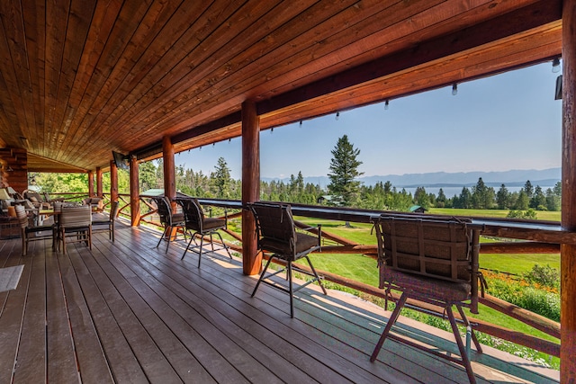 wooden terrace featuring a mountain view