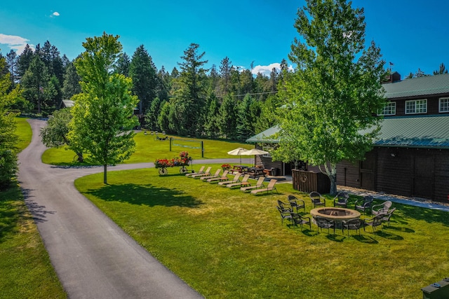 exterior space with an outdoor fire pit