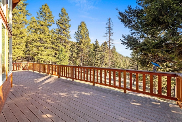 964 Elkhorn Rd, Seeley Lake, MT 59868 - wooden deck with a view of trees