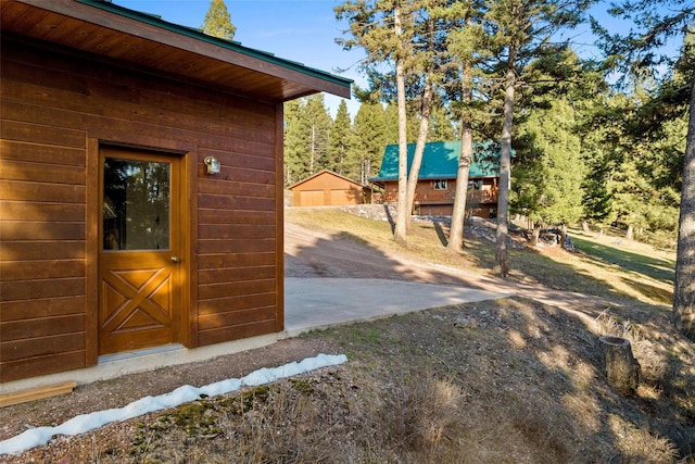 964 Elkhorn Rd, Seeley Lake, MT 59868 - view of property exterior featuring an outdoor structure
