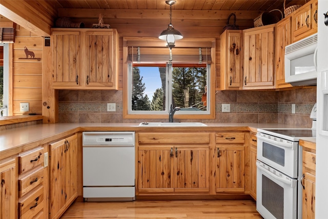 kitchen with wood ceiling, light hardwood / wood-style floors, decorative light fixtures, and white appliances