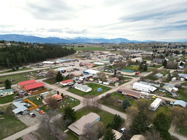 drone / aerial view featuring a mountain view