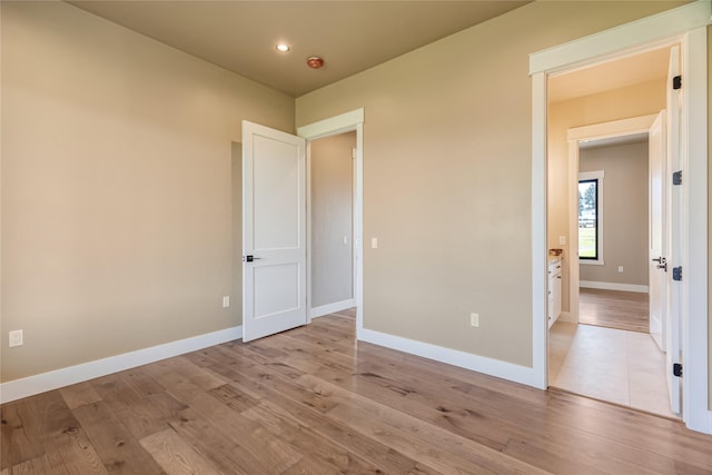 1052 Foxtail Dr, Kalispell, MT 59901 - unfurnished bedroom with recessed lighting, light wood-type flooring, and baseboards